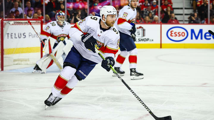 Dec 14, 2024; Calgary, Alberta, CAN; Florida Panthers center Sam Bennett (9) skates with the puck against the Calgary Flames during the second period at Scotiabank Saddledome. Mandatory Credit: Sergei Belski-Imagn Images