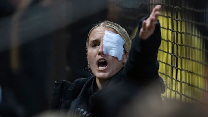 Oregon pitcher Lyndsey Grein rallies the crowd from the dugout as the Oregon Ducks host the Idaho State Bengals in an NCAA regional on May 15, 2026, at Jane Sanders Stadium in Eugene, Oregon.