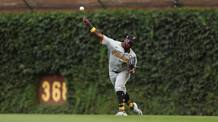 Aug 17, 2025; Chicago, Illinois, USA; Pittsburgh Pirates right fielder Ronny Simon (63) throws the ball towards home plate during eighth inning against the Chicago Cubs at Wrigley Field. Mandatory Credit: Melissa Tamez-Imagn Images