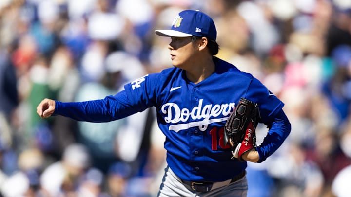 Feb 21, 2026; Tempe, Arizona, USA; Los Angeles Dodgers pitcher Yoshinobu Yamamoto against the Los Angeles Angels during a spring training game at Tempe Diablo Stadium. Mandatory Credit: Mark J. Rebilas-Imagn Images