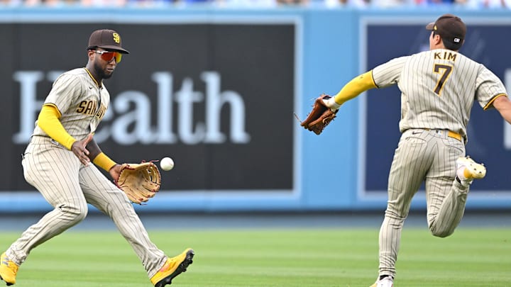 Sep 4, 2022; Los Angeles, California, USA; San Diego Padres left fielder Jurickson Profar (10) and shortstop Ha-Seong Kim (7) chase after the ball against the Los Angeles Dodgers in the fourth inning at Dodger Stadium. Mandatory Credit: Jayne Kamin-Oncea-Imagn Images Sep 4, 2022; Los Angeles, California, USA; San Diego Padres left fielder Jurickson Profar (10) and shortstop Ha-Seong Kim (7) chase after the ball against the Los Angeles Dodgers in the fourth inning at Dodger Stadium. Mandatory Credit: Jayne Kamin-Oncea-Imagn Images