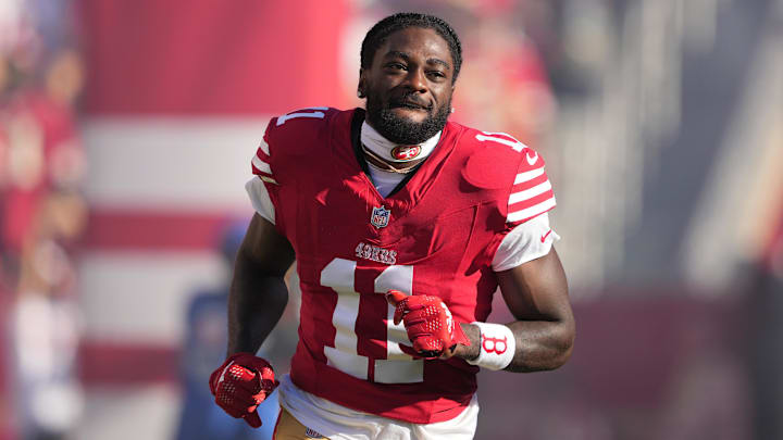 Sep 9, 2024; Santa Clara, California, USA; San Francisco 49ers wide receiver Brandon Aiyuk (11) is introduced to the crowd before the game against the New York Jets at Levi's Stadium. Mandatory Credit: Darren Yamashita-Imagn Images