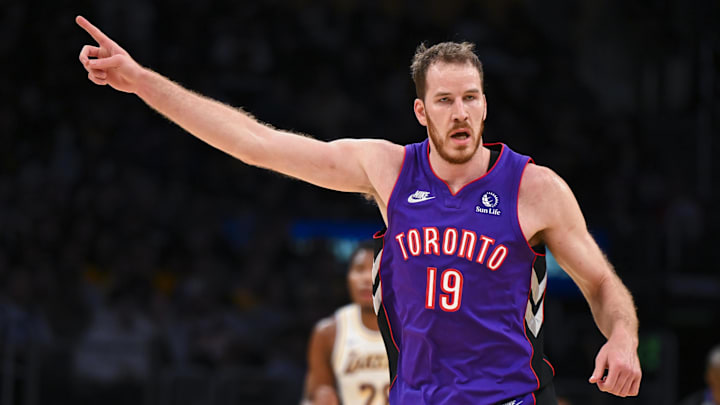 Nov 10, 2024; Los Angeles, California, USA; Toronto Raptors center Jakob Poeltl (19) points against the Los Angeles Lakers during the first half at Crypto.com Arena. Mandatory Credit: Jonathan Hui-Imagn Images Nov 10, 2024; Los Angeles, California, USA; Toronto Raptors center Jakob Poeltl (19) points against the Los Angeles Lakers during the first half at Crypto.com Arena. Mandatory Credit: Jonathan Hui-Imagn Images