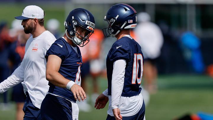 Jul 24, 2025; Englewood, CO, USA; Denver Broncos quarterback Sam Ehlinger (4) and quarterback Bo Nix (10) during Denver Broncos Training Camp. Jul 24, 2025; Englewood, CO, USA; Denver Broncos quarterback Sam Ehlinger (4) and quarterback Bo Nix (10) during Denver Broncos Training Camp.