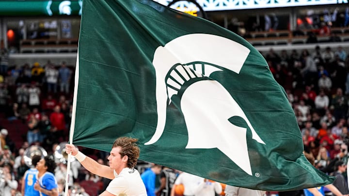 Michigan State flag is displayed as the Spartans play UCLA in a Big Ten Tournament men's basketball quarterfinal at United Center in Chicago on Friday, March 13, 2026.