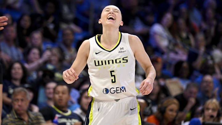 Jul 28, 2025; Arlington, Texas, USA; Dallas Wings guard Paige Bueckers (5) reacts to a call during the first half against the New York Liberty at College Park Center. Mandatory Credit: Jerome Miron-Imagn Images