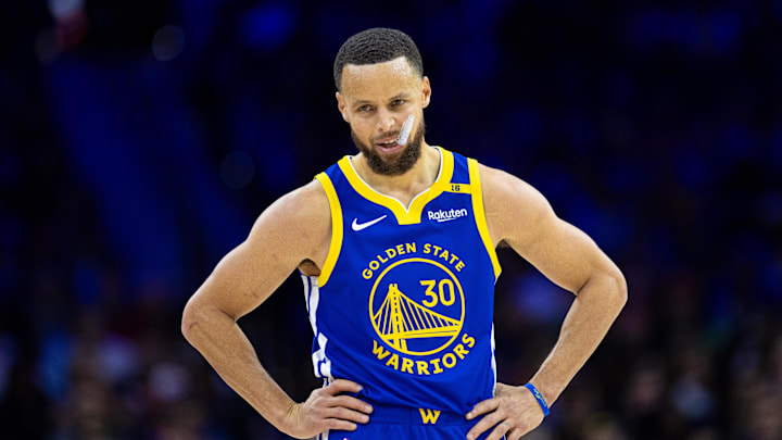 Mar 1, 2025; Philadelphia, Pennsylvania, USA; Golden State Warriors guard Stephen Curry (30) looks on against the Philadelphia 76ers during the second quarter at Wells Fargo Center. Mandatory Credit: Bill Streicher-Imagn Images