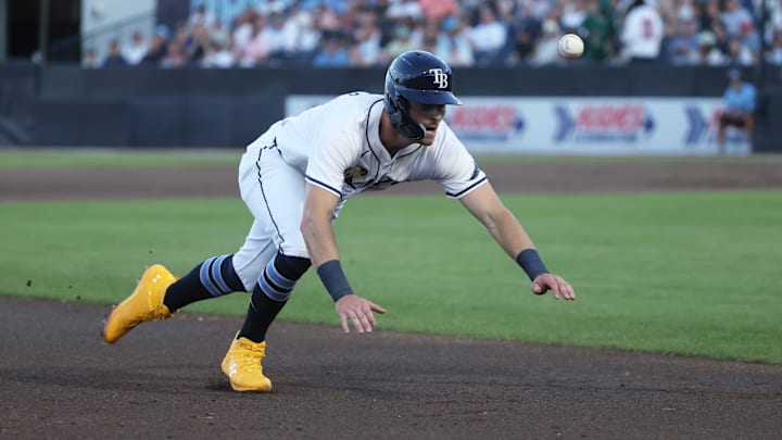 St. Petersburg, Florida, USA; Tampa Bay Rays outfielder Kameron Misner (26) slides into third base against the New York Yankees during the first inning at George M. Steinbrenner Field. St. Petersburg, Florida, USA; Tampa Bay Rays outfielder Kameron Misner (26) slides into third base against the New York Yankees during the first inning at George M. Steinbrenner Field.