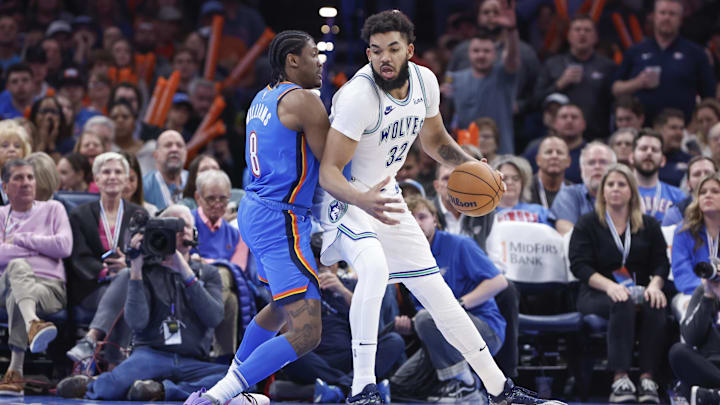 Jan 29, 2024; Oklahoma City, Oklahoma, USA; Minnesota Timberwolves center Karl-Anthony Towns (32) moves against Oklahoma City Thunder forward Jalen Williams (8) during the second half at Paycom Center. Mandatory Credit: Alonzo Adams-Imagn Images