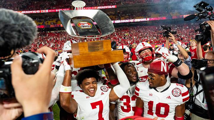 Malcolm Hartzog Jr. hoists the Kansas City Classic trophy after the Huskers' 2025 win against Cincinnati. Malcolm Hartzog Jr. hoists the Kansas City Classic trophy after the Huskers' 2025 win against Cincinnati.