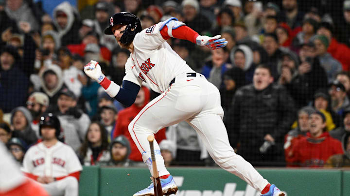 Apr 7, 2026; Boston, Massachusetts, USA; Boston Red Sox shortstop Trevor Story (10) hits a two run RBI double  during sixth inning against the Milwaukee Brewers at Fenway Park. Mandatory Credit: Eric Canha-Imagn Images