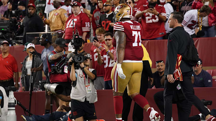 Sep 9, 2024; Santa Clara, California, USA; San Francisco 49ers offensive tackle Trent Williams (71) leaves the field injured in the fourth quarter against the New York Jets at Levi's Stadium. Mandatory Credit: David Gonzales-Imagn Images Sep 9, 2024; Santa Clara, California, USA; San Francisco 49ers offensive tackle Trent Williams (71) leaves the field injured in the fourth quarter against the New York Jets at Levi's Stadium. Mandatory Credit: David Gonzales-Imagn Images