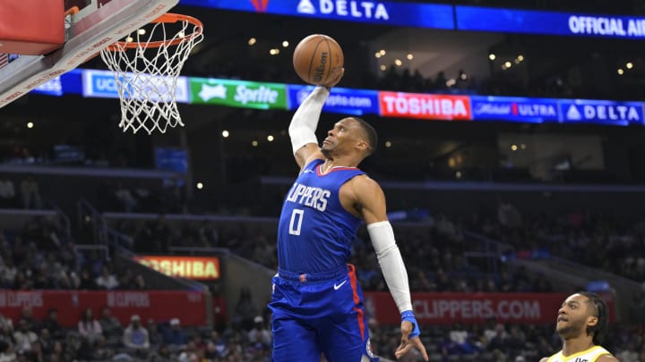 Apr 5, 2024; Los Angeles, California, USA; Los Angeles Clippers guard Russell Westbrook (0) goes up for a dunk in the second half against the Utah Jazz at Crypto.com Arena. Mandatory Credit: Jayne Kamin-Oncea-USA TODAY Sports
