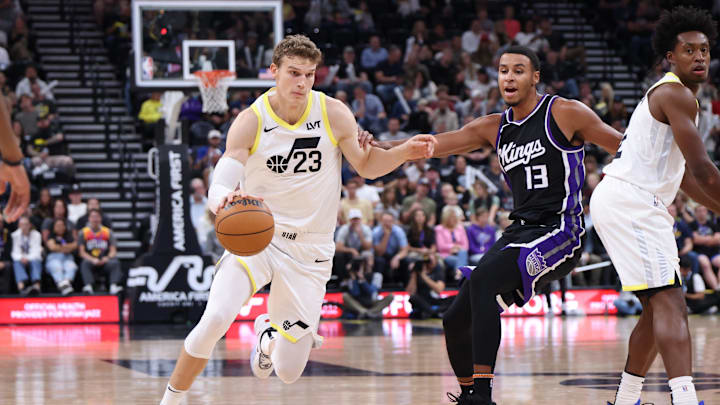 Oct 15, 2024; Salt Lake City, Utah, USA; Utah Jazz forward Lauri Markkanen (23) drives against Sacramento Kings forward Keegan Murray (13) during the second quarter at Delta Center. Mandatory Credit: Rob Gray-Imagn Images Oct 15, 2024; Salt Lake City, Utah, USA; Utah Jazz forward Lauri Markkanen (23) drives against Sacramento Kings forward Keegan Murray (13) during the second quarter at Delta Center. Mandatory Credit: Rob Gray-Imagn Images