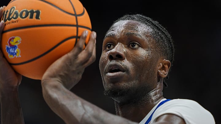Nov 15, 2025; Lawrence, Kansas, USA; Kansas Jayhawks forward Flory Bidunga (40) shoots a free throw during the first half against the Princeton Tigers at Allen Fieldhouse. Mandatory Credit: Jay Biggerstaff-Imagn Images