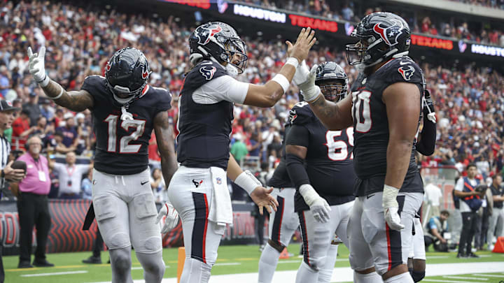 Sep 29, 2024; Houston, Texas, USA; Houston Texans quarterback C.J. Stroud (7) celebrates with center Juice Scruggs (70) after a Texans touchdown during the fourth quarter against the Jacksonville Jaguars at NRG Stadium. Sep 29, 2024; Houston, Texas, USA; Houston Texans quarterback C.J. Stroud (7) celebrates with center Juice Scruggs (70) after a Texans touchdown during the fourth quarter against the Jacksonville Jaguars at NRG Stadium.