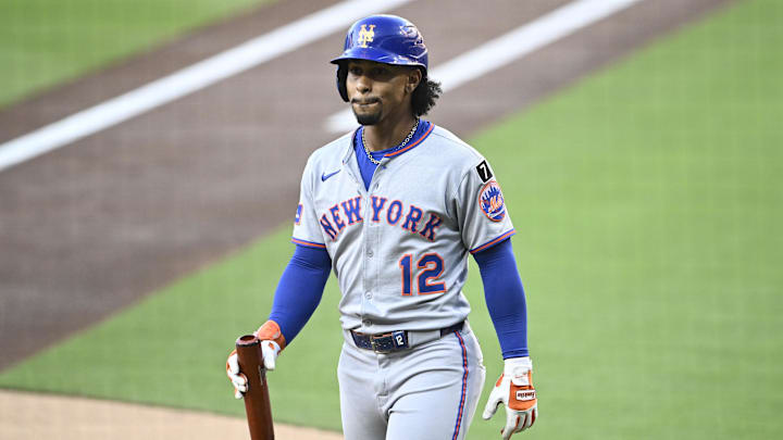Jul 28, 2025; San Diego, California, USA; New York Mets shortstop Francisco Lindor (12) walks back to the dugout after striking out during the first inning against the San Diego Padres at Petco Park. Mandatory Credit: Denis Poroy-Imagn Images