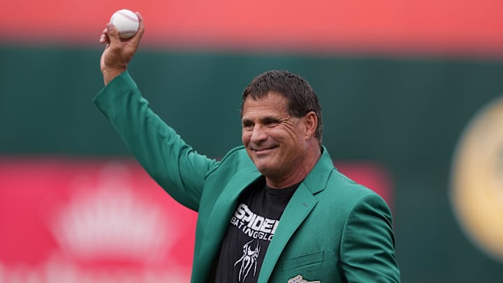 Oakland Athletics former outfielder Jose Canseco prepares to throw the ceremonial first pitch before the game against the San Francisco Giants. Oakland Athletics former outfielder Jose Canseco prepares to throw the ceremonial first pitch before the game against the San Francisco Giants.