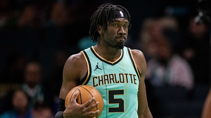 Jan 24, 2025; Charlotte, North Carolina, USA; Charlotte Hornets center Mark Williams (5) holds the ball against the Portland Trail Blazers during the second quarter at Spectrum Center. Mandatory Credit: Scott Kinser-Imagn Images