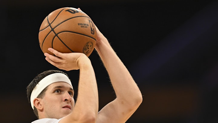 Nov 2, 2025; Los Angeles, California, USA; Los Angeles Lakers guard Austin Reaves (15) shoots before the game against the Miami Heat at Crypto.com Arena. Mandatory Credit: Jonathan Hui-Imagn Images