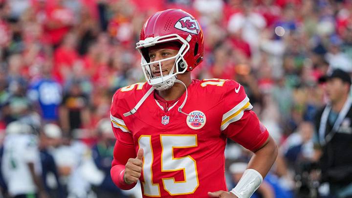 Kansas City Chiefs quarterback Patrick Mahomes (15) runs on field against the Seattle Seahawks after introductions prior to the game at Arrowhead Stadium. Kansas City Chiefs quarterback Patrick Mahomes (15) runs on field against the Seattle Seahawks after introductions prior to the game at Arrowhead Stadium.