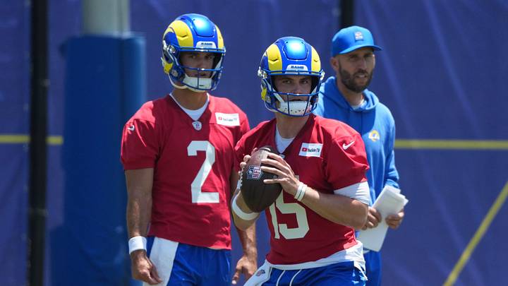 Jun 2, 2026; Woodland Hills, CA, USA; Los Angeles Rams quarterback Ty Simpson (15) throws the ball as quarterback Matthew Caldwell (2) and quarterbacks coach Dave Ragone watch during organized team activities at Rams Practice Facility. Mandatory Credit: Kirby Lee-Imagn Images Jun 2, 2026; Woodland Hills, CA, USA; Los Angeles Rams quarterback Ty Simpson (15) throws the ball as quarterback Matthew Caldwell (2) and quarterbacks coach Dave Ragone watch during organized team activities at Rams Practice Facility. Mandatory Credit: Kirby Lee-Imagn Images