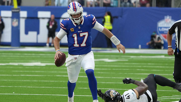 Oct 8, 2023; London United Kingdom, Buffalo Bills quarterback Josh Allen (17) carries the ball