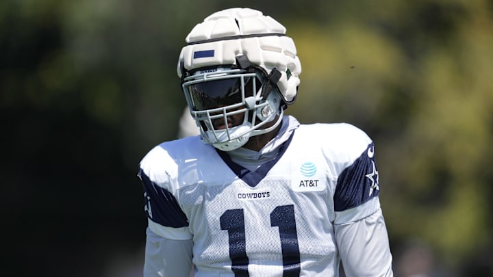 Dallas Cowboys linebacker Micah Parsons wears a Guardian helmet cap during joint practice against the Los Angeles Chargers.
