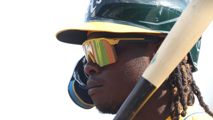 Sep 21, 2025; Pittsburgh, Pennsylvania, USA;  Athletics center fielder Lawrence Butler (4) looks on in the on-deck circle against the Pittsburgh Pirates .during the fifth inning at PNC Park. Mandatory Credit: Charles LeClaire-Imagn Images