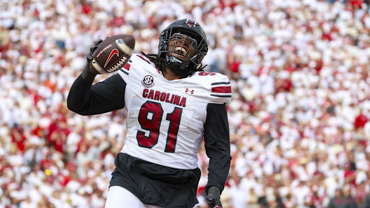 Oct 19, 2024; Norman, Oklahoma, USA;  South Carolina Gamecocks defensive tackle Tonka Hemingway (91) reacts after returning a fumble for a touchdown during the first half against the Oklahoma Sooners at Gaylord Family-Oklahoma Memorial Stadium. Mandatory Credit: Kevin Jairaj-Imagn Images