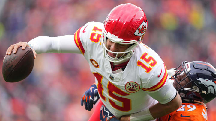 Oct 29, 2023; Denver, Colorado, USA; Denver Broncos cornerback Ja'Quan McMillian (29) tackles Kansas