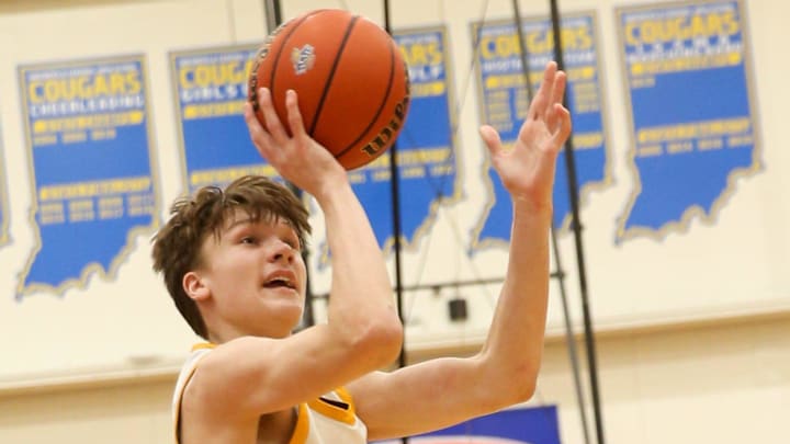 Greenfield Centrals's Braylon Mullins (24) goes in for a shot as New Palestine takes on Greenfield Central High School during the IHSAA Class 4A S9 Boys Basketball Sectinal Championship, Mar 2, 2024; Greenfield, IN, USA; at Greenfield-Central High School.