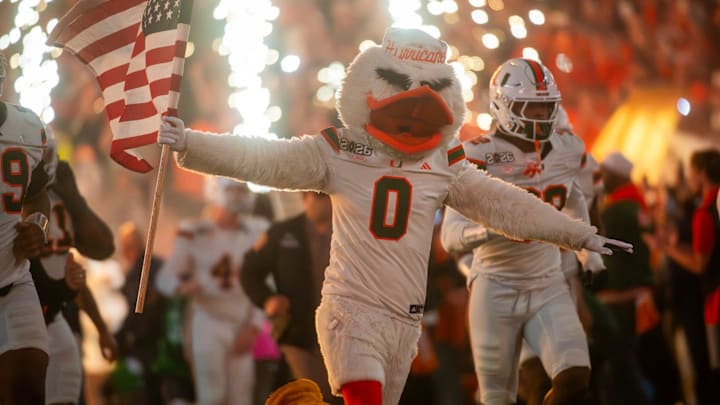 Sebastian runs out with the Miami Hurricanes before the College Football Playoff National Championship college football game at Hard Rock Stadium in Miami Gardens on Monday, Jan. 19, 2026.