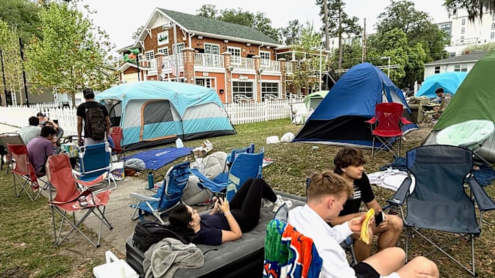 University of Florida students camp outside The Swamp Restaurant, 1104 SW Second Ave., Monday ahead of the NCAA championship game between the Florida Gators and the Houston Cougars.