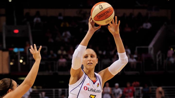 Aug 26, 2010; Phoenix, AZ, USA; Phoenix Mercury guard Diana Taurasi (3) makes a pass during the first half against the San Antonio Silver Stars in game one of the Western Conference semi-finals in the 2010 WNBA Playoffs at US Airways Center.  The Mercury defeated the Silver Stars 106-93.  Mandatory Credit: Jennifer Stewart-Imagn Images