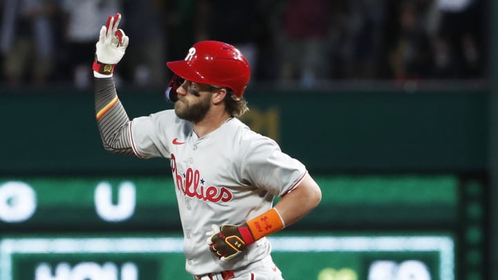 Jul 20, 2024; Pittsburgh, Pennsylvania, USA; Philadelphia Phillies first baseman Bryce Harper (3) gestures as he runs the bases after hitting a solo home run against the Pittsburgh Pirates during the ninth inning at PNC Park. The Pirates won 4-1. Jul 20, 2024; Pittsburgh, Pennsylvania, USA; Philadelphia Phillies first baseman Bryce Harper (3) gestures as he runs the bases after hitting a solo home run against the Pittsburgh Pirates during the ninth inning at PNC Park. The Pirates won 4-1.