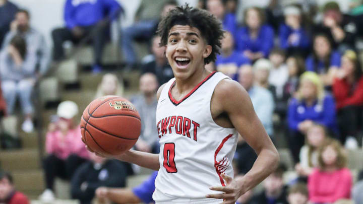 Former Newport point guard Tay Kinney (0) reacts after scoring two of his 13 points in the first half against Washington County at Wednesday's 2023 King of the Bluegrass basketball tournament at Fairdale High School. Dec. 20, 2023 Former Newport point guard Tay Kinney (0) reacts after scoring two of his 13 points in the first half against Washington County at Wednesday's 2023 King of the Bluegrass basketball tournament at Fairdale High School. Dec. 20, 2023