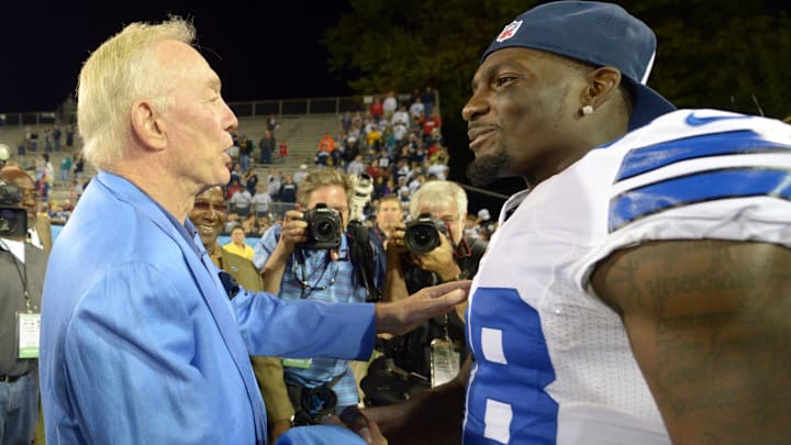 Aug 4, 2013; Canton, OH, USA; Dallas Cowboys owner Jerry Jones (left) shakes hands with receiver Dez