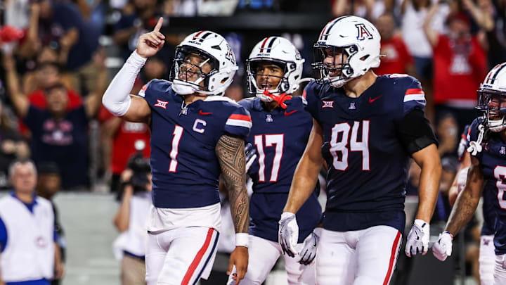 Aug 30, 2025; Tucson, Arizona, USA; Arizona Wildcats quarterback Noah Fifita (1) points up to the sky after scoring a touchdown during the third quarter of the game against the Hawaii Rainbow Warriors at Arizona Stadium. Mandatory Credit: Aryanna Frank-Imagn Images Aug 30, 2025; Tucson, Arizona, USA; Arizona Wildcats quarterback Noah Fifita (1) points up to the sky after scoring a touchdown during the third quarter of the game against the Hawaii Rainbow Warriors at Arizona Stadium. Mandatory Credit: Aryanna Frank-Imagn Images