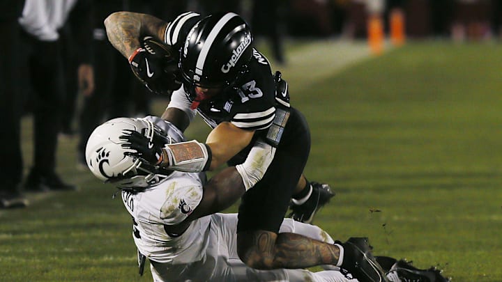 Jaylin Noel runs over a Cincinnati defender while making a catch this past Saturday night. 