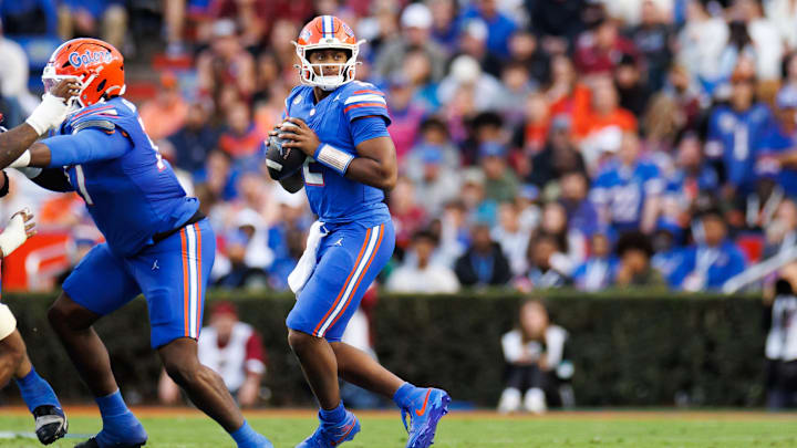Nov 29, 2025; Gainesville, Florida, USA; Florida Gators quarterback DJ Lagway (2) looks to throw against the Florida State Seminoles during the first half at Ben Hill Griffin Stadium. Mandatory Credit: Matt Pendleton-Imagn Images