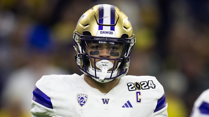 Jan 8, 2024; Houston, TX, USA; Washington Huskies wide receiver Rome Odunze (1) against the Michigan