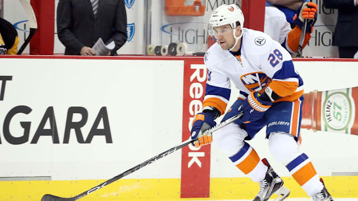 Jan 2, 2016; Pittsburgh, PA, USA; against New York Islanders defenseman Marek Zidlicky (28) skates with the puck against the Pittsburgh Penguins during the first period at the CONSOL Energy Center. Mandatory Credit: Charles LeClaire-USA TODAY Sports