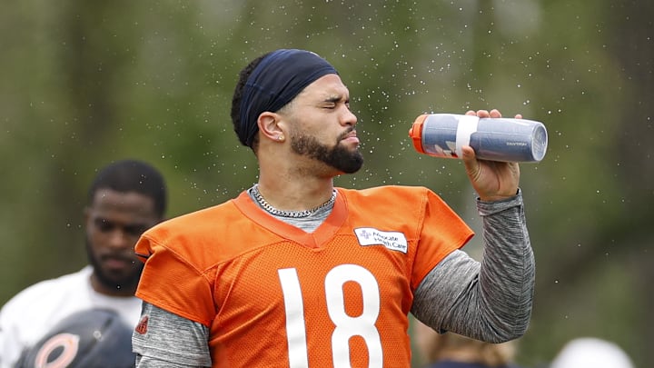 Jun 3, 2025; Lake Forest, IL, USA; Chicago Bears quarterback Caleb Williams (18) cools off during minicamp at Halas Hall. Jun 3, 2025; Lake Forest, IL, USA; Chicago Bears quarterback Caleb Williams (18) cools off during minicamp at Halas Hall.