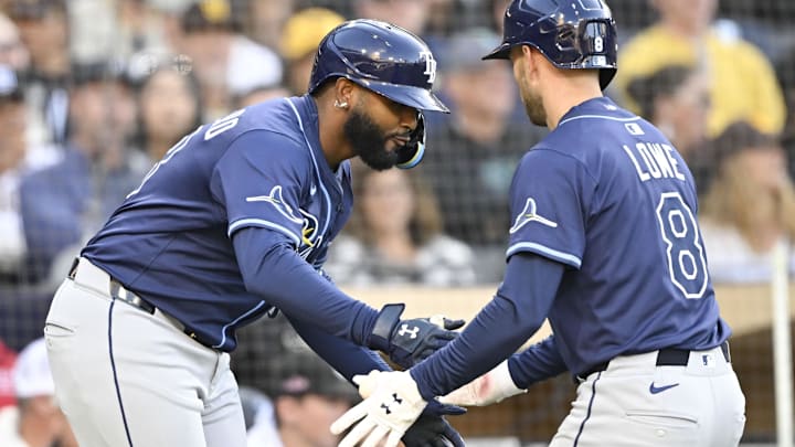 Tampa Bay second baseman Brandon Lowe (right) is congratulated by Junior Caminero after hitting a third-inning home run. Tampa Bay second baseman Brandon Lowe (right) is congratulated by Junior Caminero after hitting a third-inning home run.