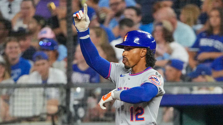 Jul 11, 2025; Kansas City, Missouri, USA; New York Mets shortstop Francisco Lindor (12) celebrates after hitting a single against the Kansas City Royals in the third inning at Kauffman Stadium. Mandatory Credit: Denny Medley-Imagn Images