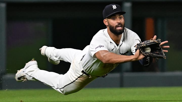 Sep 25, 2024; Detroit, Michigan, USA;  Detroit Tigers left fielder Riley Greene (31) makes a diving catch against the Tampa Bay Rays for the last out of the eighth inning at Comerica Park.