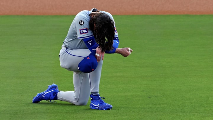 Oct 20, 2024; Los Angeles, California, USA; New York Mets outfielder Jesse Winker (3) kneels on the field before playing against the Los Angeles Dodgers during game six of the NLCS for the 2024 MLB playoffs at Dodger Stadium. Mandatory Credit: Jason Parkhurst-Imagn Images Oct 20, 2024; Los Angeles, California, USA; New York Mets outfielder Jesse Winker (3) kneels on the field before playing against the Los Angeles Dodgers during game six of the NLCS for the 2024 MLB playoffs at Dodger Stadium. Mandatory Credit: Jason Parkhurst-Imagn Images