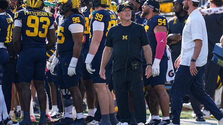 Michigan head coach Kyle Whittingham watches a replay against Indiana Michigan head coach Kyle Whittingham watches a replay against Indiana