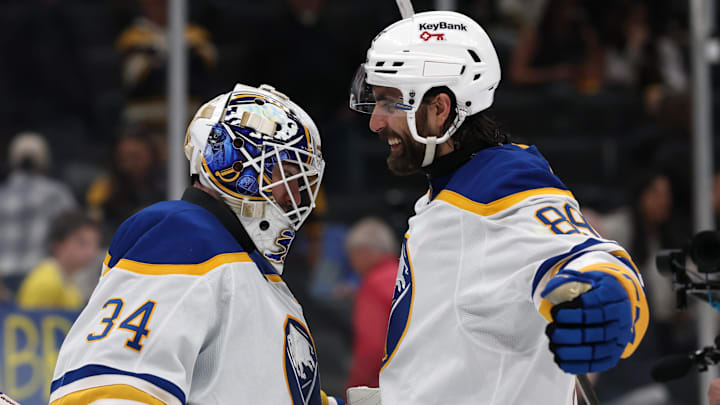 May 1, 2026; Boston, Massachusetts, USA; Buffalo Sabres right wing Alex Tuch (89) celebrates with goaltender Alex Lyon (34) after their 4-1 win over the Boston Bruins in game six of the first round of the 2026 Stanley Cup Playoffs at TD Garden. Mandatory Credit: Winslow Townson-Imagn Images